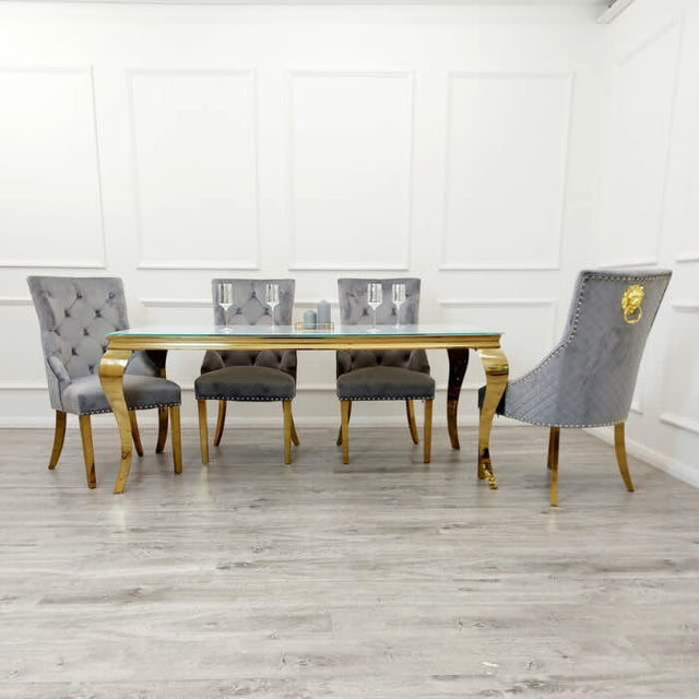 luxury-rectangular-glass-dining-table-with-gold-legs-and-luxury-velvet-gold-dining-chairs-with-lion-knocker-dining-table-set-for-4-to-8