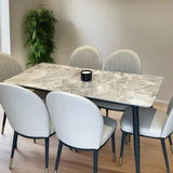 140cm rectangular grey marble dining table and 6 cream leather dining chairs