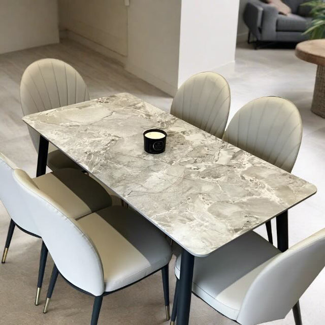 140cm rectangular grey marble dining table and 6 cream leather dining chairs