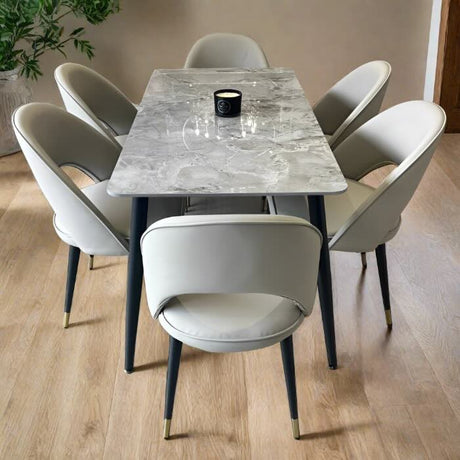 140cm rectangular grey marble dining table and 6 cream leather dining chairs