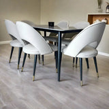 140cm rectangular grey marble dining table and 6 cream leather dining chairs