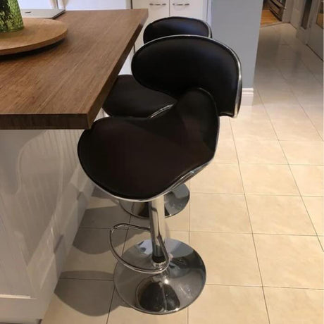 modern-adjustable-and-swivel-black-leather-bar-stool-with-footrest-and-chrome-metal-base