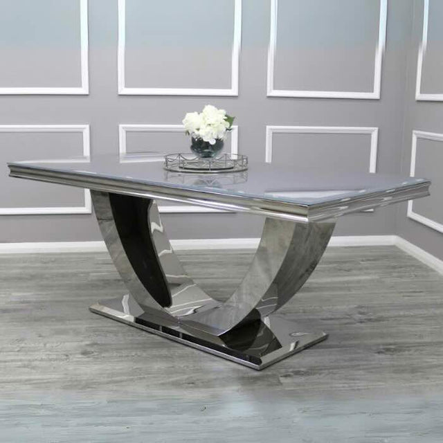    modern-grey-glass-dining-table-with-stainless-steel-base-and-high-back-velvet-dining-chairs-with-lion-knocker-6-8-seater-kitchen-table-set