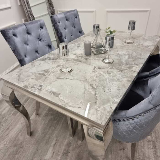 modern-grey-marble-dining-table-with-stainless-steel-frame-and-classic-velvet-dining-chairs-with-lion-knocker-dining-table-set-for-6-to-8