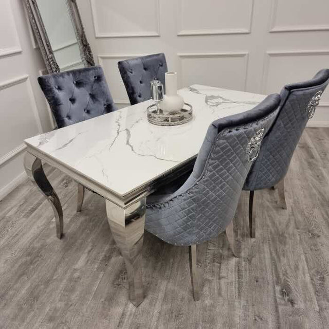 modern-white-marble-dining-table-with-stainless-steel-frame-and-classic-velvet-dining-chairs-with-lion-knocker-dining-table-set-for-6