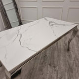 modern-white-marble-dining-table-with-stainless-steel-frame-and-high-back-velvet-dining-chairs-with-lion-knocker-6-8-seater-kitchen-table-set