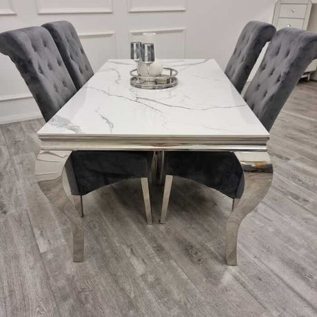 modern-white-marble-dining-table-with-stainless-steel-frame-and-high-back-velvet-dining-chairs-with-lion-knocker-6-8-seater-kitchen-table-set